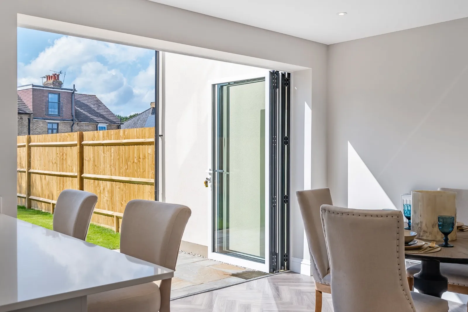 a dining room with a sliding glass door